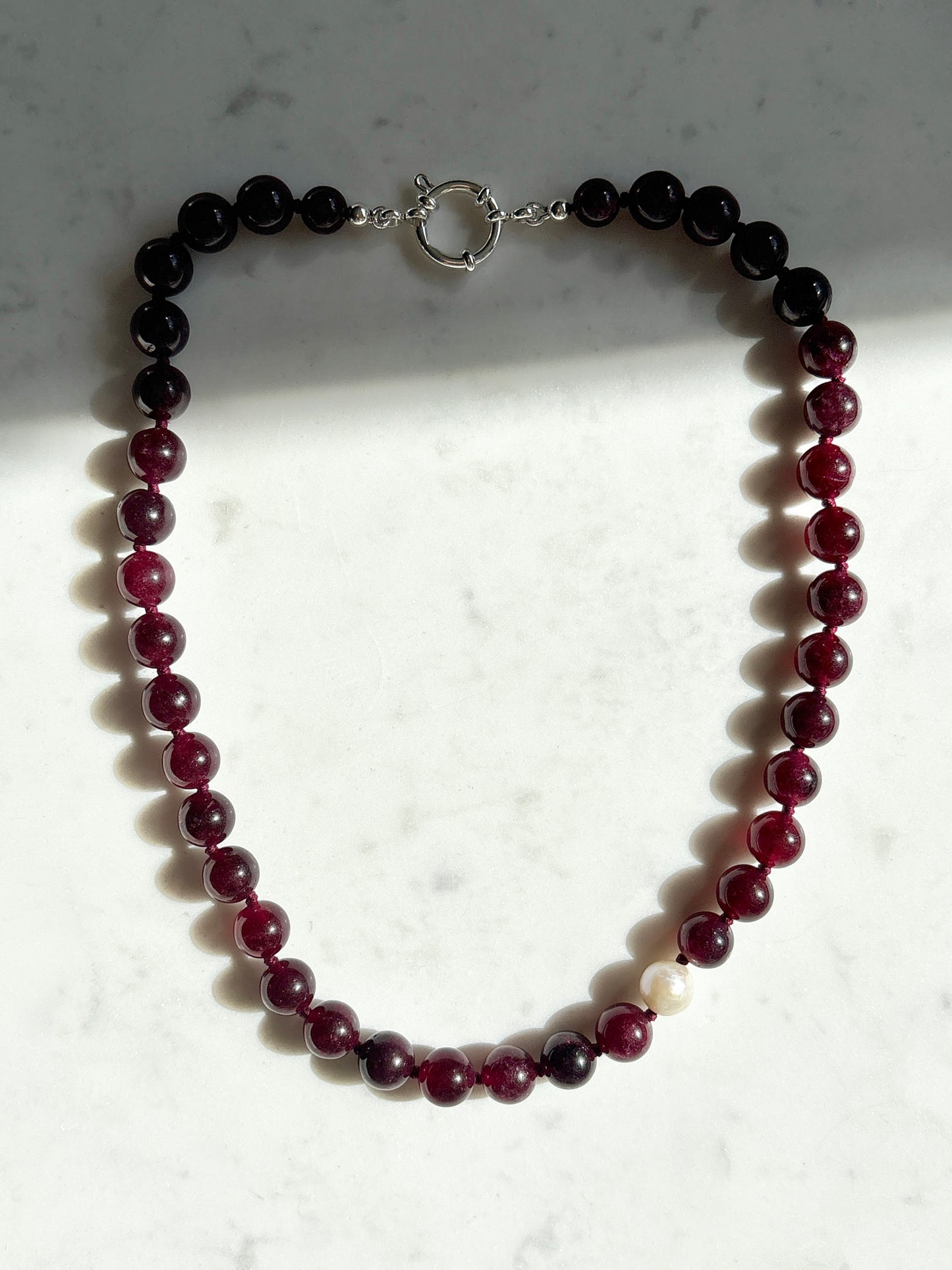 Garnet O’Clock Necklace